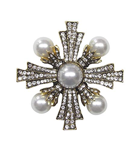 Broche de acero en forma de cruz estrellada con brillantes de cristal blanco y perlas nacaradas.