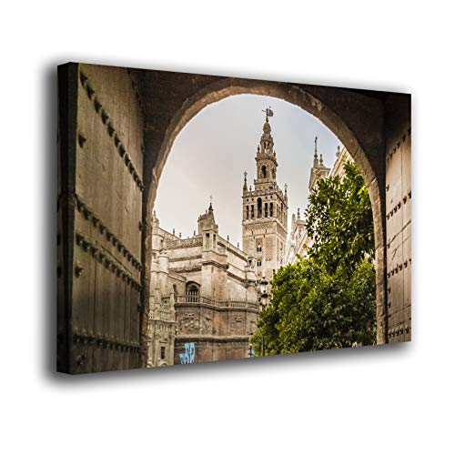 Cuadro lienzo canvas La Giralda de Sevilla vista a través de una puerta Andalucia – Varias medidas - Lienzo de tela bastidor de madera de 3 cm - Impresion alta resolucion (50, 33)